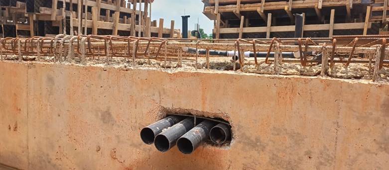 A pipe in a wall
Description automatically generated with medium confidence
